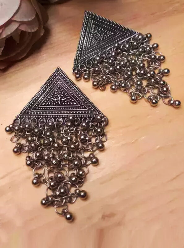 triangle-oxidised-black-earrings-nesy-lifestyle-earrings-on-jeans-top